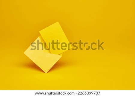 Yellow color paper office envelope with greeting, invitation or business card with copy space isolated on the bright solid fond plain yellow background
