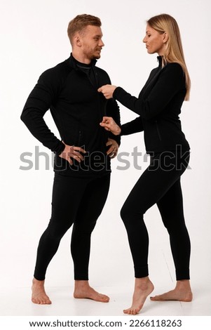 Sports family, husband and wife in thermal clothes.