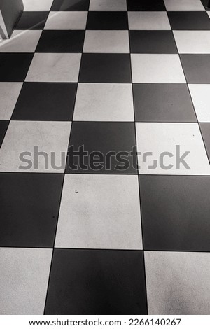 Classic chequered black and white floor.