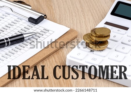 IDEAL CUSTOMER text with chart and calculator and coins , business