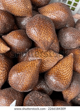 Selective focus of a pile of salak fruit in the fruit market