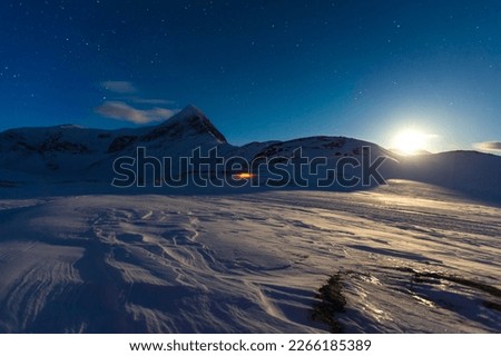 Full moon with tent in the snow, Kungsleden or king's trail, Province of Lapland, Sweden, Scandinavia