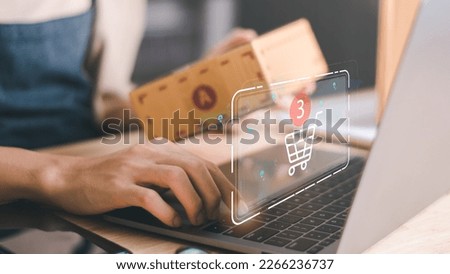 Startup or small business entrepreneur,Make a note of the delivery address from the customer,order management in online stores, shopping on the internet,Selling online on the Internet,SME,e-commerce Royalty-Free Stock Photo #2266236737