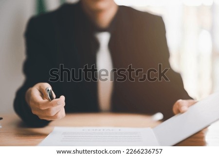 Agents Brokers Send pens and contracts to partners, handle business documents and agreements, Business contract signing, business cooperation, commercial signing, Signing an agreement