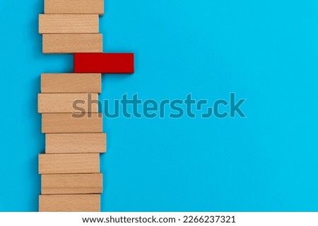 Red block out standing crowd Royalty-Free Stock Photo #2266237321