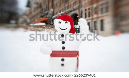Selective focus photo of Bonhomme, the official snowman representative of the Québec Winter Carnival. Royalty-Free Stock Photo #2266239401