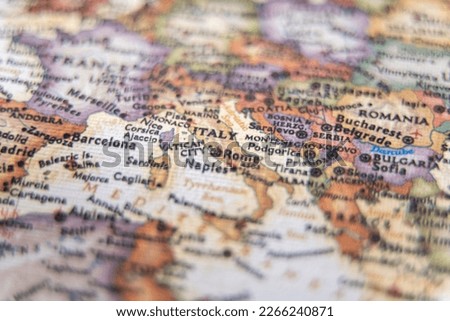 Map view of Italy. Selective focus on label close up shot.
