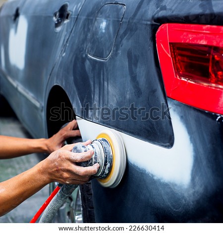 Car body work auto repair paint after the accident. Royalty-Free Stock Photo #226630414