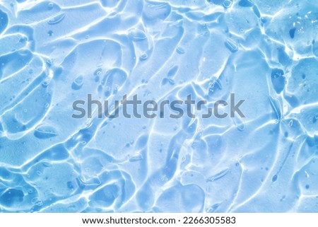 blue water wave abstract, pure natural ripple and bubble texture, gel soap, background photography