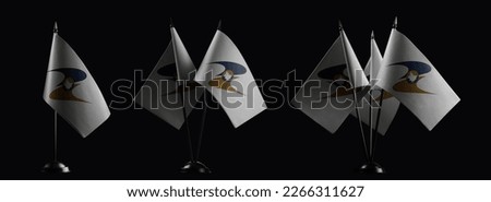 Small national flags of the Eurasian Economic Union on a black background. Royalty-Free Stock Photo #2266311627