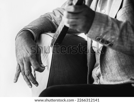 An Artist Playing the Traditional Turkish Instrument Royalty-Free Stock Photo #2266312141