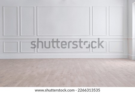 White classic wall background, brown parquet floor, home furniture detail, frame and vase of plant. Royalty-Free Stock Photo #2266313535