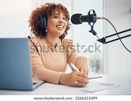 Laptop, microphone and radio with a black woman presenter talking during a broadcast while live streaming. Influencer, talk show and media with a female journalist or host chatting on a mic