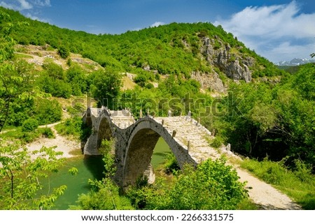 Zagorohoria stone bridge, Greece. Plakidas arch bridge Royalty-Free Stock Photo #2266331575