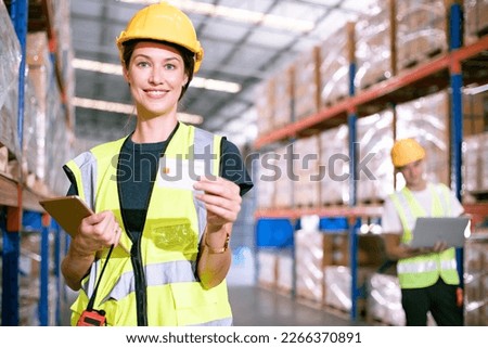 African-American woman foreman with positive thinking and carry credit cards for convenience at wholesale warehouse stores. self service concept