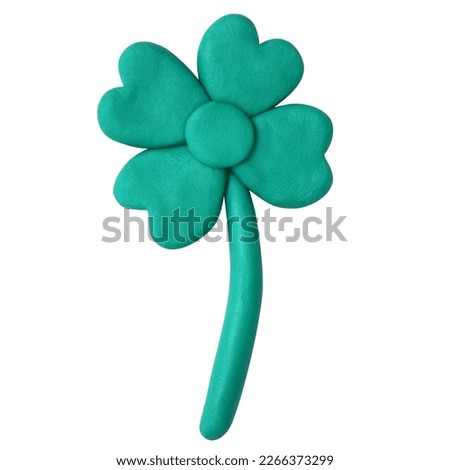 Green plasticine shamrock, Clover, 4 green heart-shaped. St. Patrick's Day symbol.
