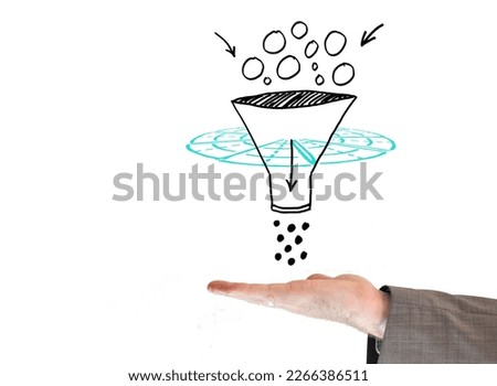Hand with sales funnel sketch Royalty-Free Stock Photo #2266386511