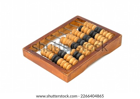 Obsolete wooden abacus, white background Royalty-Free Stock Photo #2266404865