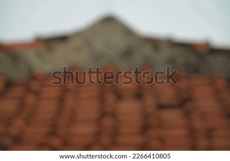 stacked and defocused photo of roof of house