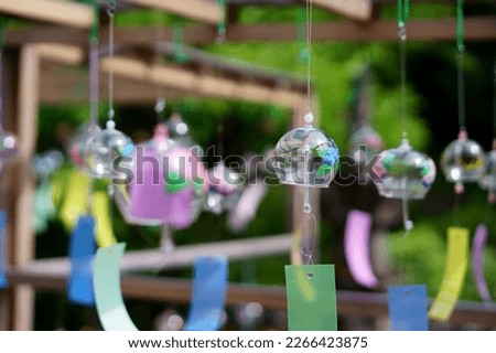 Wind chimes hanging in a Japanese temple Royalty-Free Stock Photo #2266423875