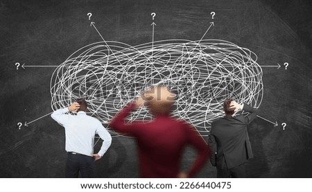 Business Team Thinking in Solving Difficult and Complex Problem Concept. Confused People Wonder at Perplexed Complex Messy Line. Teamwork and Brainstorming Idea Royalty-Free Stock Photo #2266440475