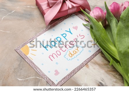 Picture with text HAPPY MOTHER'S DAY, tulip flowers and gift box on grunge background, closeup