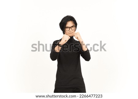 Punching fist to fight or angry Of Handsome Asian Man Isolated On White Background Royalty-Free Stock Photo #2266477223