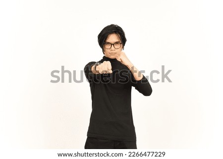 Punching fist to fight or angry Of Handsome Asian Man Isolated On White Background Royalty-Free Stock Photo #2266477229
