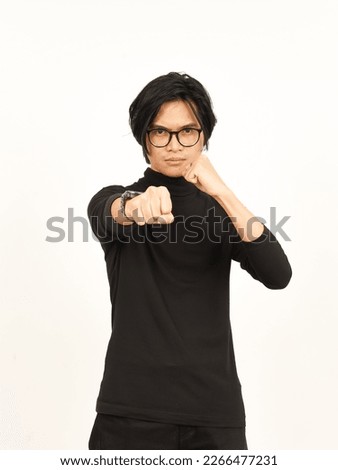 Punching fist to fight or angry Of Handsome Asian Man Isolated On White Background Royalty-Free Stock Photo #2266477231
