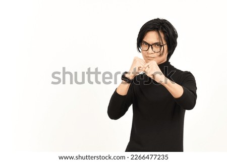 Punching fist to fight or angry Of Handsome Asian Man Isolated On White Background Royalty-Free Stock Photo #2266477235