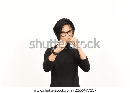 Punching fist to fight or angry Of Handsome Asian Man Isolated On White Background Royalty-Free Stock Photo #2266477237