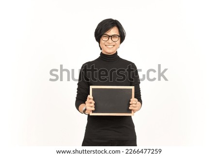 Showing, Presenting and holding Blank Blackboard Of Handsome Asian Man Isolated On White Background