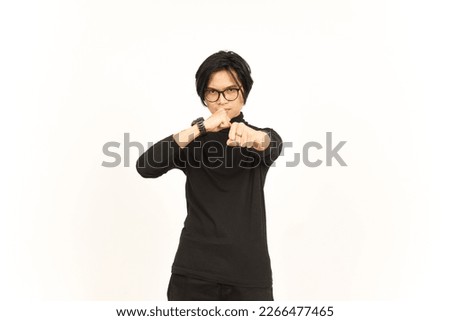 Punching fist to fight or angry Of Handsome Asian Man Isolated On White Background Royalty-Free Stock Photo #2266477465