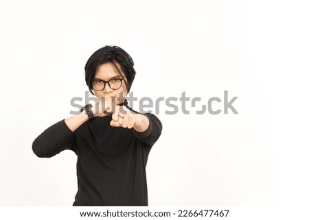 Punching fist to fight or angry Of Handsome Asian Man Isolated On White Background Royalty-Free Stock Photo #2266477467