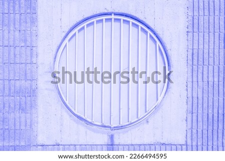 Circle, surreal iron structure, window, door on a purple brick stone wall, abstract background.