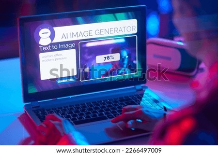 Seen from behind modern business woman with laptop using text to image artificial intelligence image generator. Royalty-Free Stock Photo #2266497009