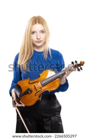 Elegant blond girl with a violin. Female violinist isolated on white background.