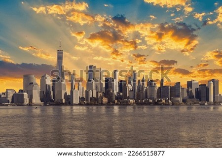 Amazing panoramic view of New York City skyline and skyscraper at sunset. Beautiful view of downtown Manhattan.