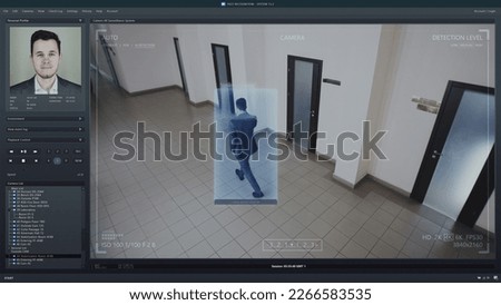 Playback office CCTV camera on computer. Interface of AI software with digital facial recognition and personal profile with information about people. Security camera with face scanning analyze system. Royalty-Free Stock Photo #2266583535
