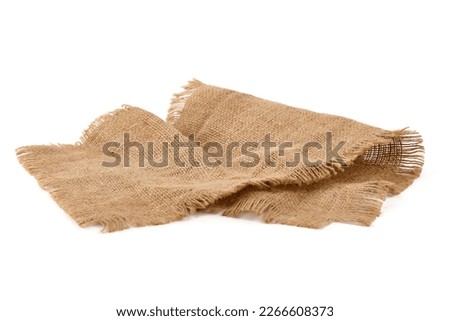 Old burlap fabric napkin, sackcloth piece isolated on white background Royalty-Free Stock Photo #2266608373
