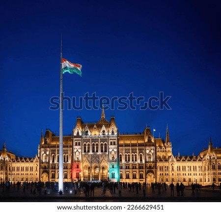 Illuminated Parliament from the Kossuth square in the blue hour in national colors Royalty-Free Stock Photo #2266629451