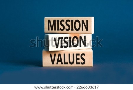 Mission vision values symbol. Concept words Mission Vision Values on wooden blocks on a beautiful grey table grey background. Business mission vision values concept. Copy space. Royalty-Free Stock Photo #2266633617