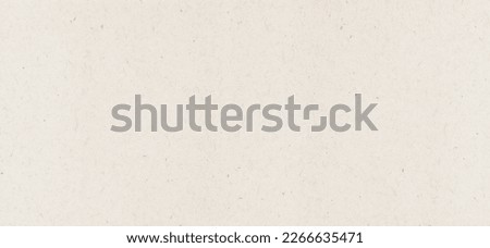 Craft eco textured paper sheet background beige color for cards and other design ideas beige color.White paper texture with particles. Abstract paper background Royalty-Free Stock Photo #2266635471
