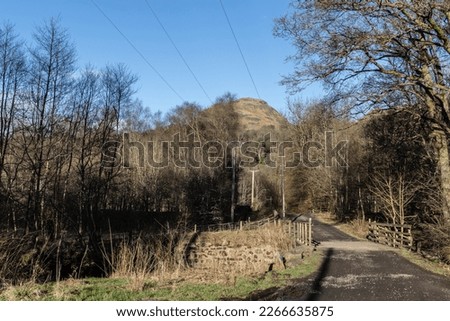 Dumgoyne Hill from the John Muir Way and West Highland Way shared path near Dumgoyach hill  in Strathblane valley, Central Scotland. Royalty-Free Stock Photo #2266635875