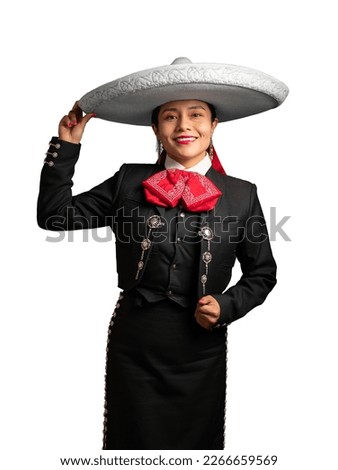female mexican mariachi woman smiling using a traditional mariachi girl suit on a pure white background. good looking latin hispanic musician feminine mariachi wearing a mexican white hat or sombrero