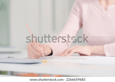 A woman taking an exam