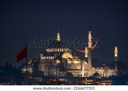 Crescent moon sunset with Suleymaniye Mosque (Ottoman imperial mosque). View from Üsküdar in Istanbul. Turkish Century 2023 Royalty-Free Stock Photo #2266677351