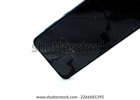 smartphone  crashed onto the white floor so the protective film cracked