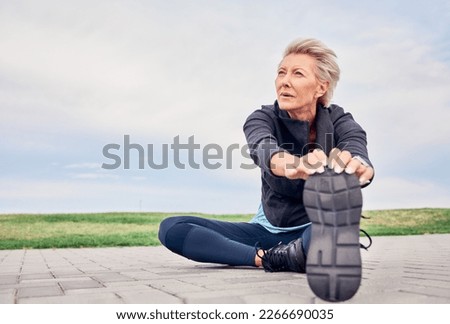Woman, stretching exercise and fitness on blue sky mockup, park ground and training for cardio wellness. Senior female warm up legs outdoor for workout, sports running and thinking of healthy body Royalty-Free Stock Photo #2266690035