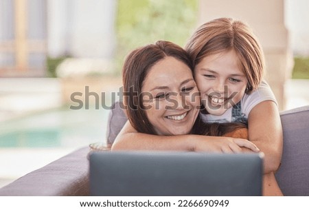 Mom, child and sofa with laptop, smile or happy for video, streaming or movie on internet. Couch, mother and daughter with hug, bonding or love for movies on web, app or subscription service in home